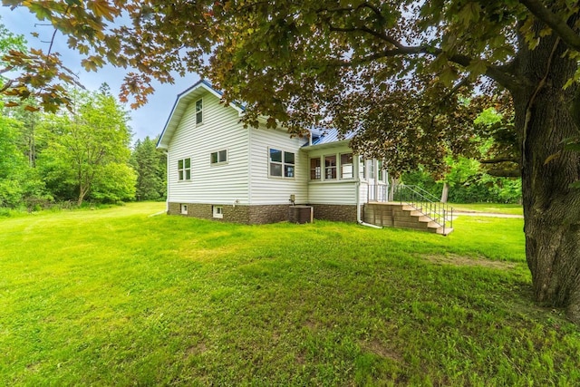 2941 Plover Rd, Wisconsin Rapids, WI 54494 - view of side of home with a lawn