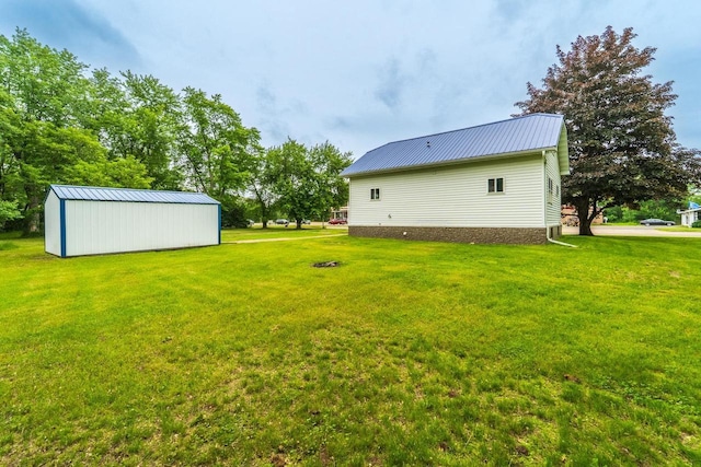 2941 Plover Rd, Wisconsin Rapids, WI 54494 - view of green lawn featuring an outbuilding