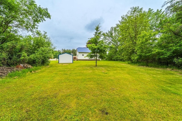 2941 Plover Rd, Wisconsin Rapids, WI 54494 - view of grassy yard featuring a storage shed