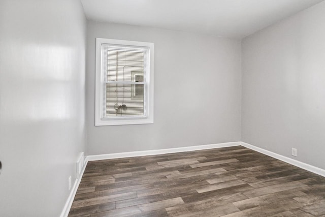 4636 N 19th St, Milwaukee, WI 53209 - empty room with dark wood-style flooring and baseboards