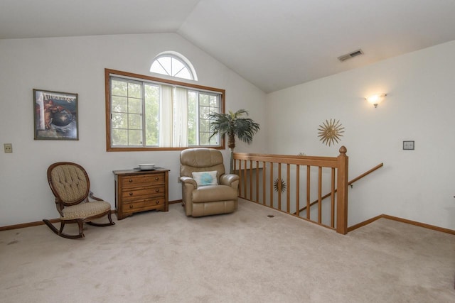 3910 S 92nd St Unit 3910, Milwaukee, WI 53228 - living area featuring an upstairs landing, carpet, and vaulted ceiling