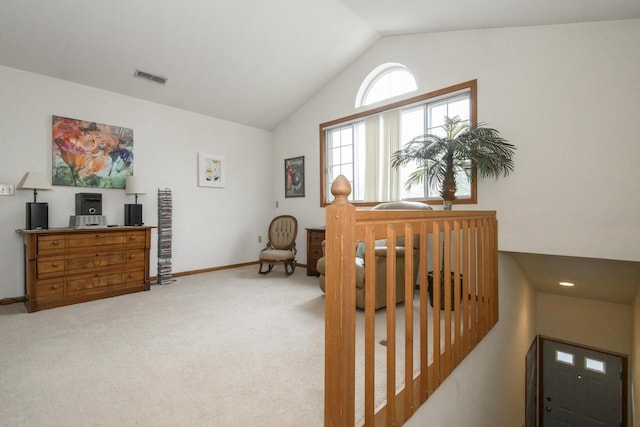 3910 S 92nd St Unit 3910, Milwaukee, WI 53228 - living area with an upstairs landing, light carpet, and high vaulted ceiling