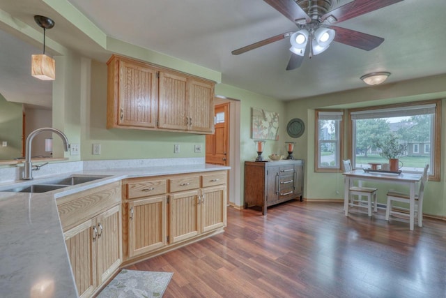W227N2527 Meadowood Ln, Waukesha, WI 53186 - kitchen featuring dark wood finished floors, ceiling fan, light brown cabinets, and decorative light fixtures