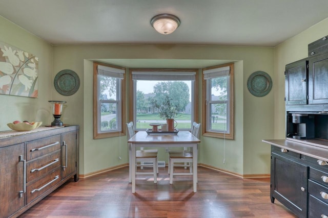 W227N2527 Meadowood Ln, Waukesha, WI 53186 - dining area featuring dark wood-type flooring