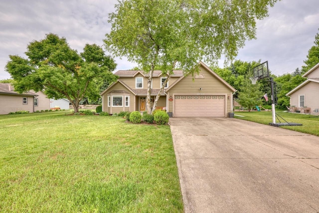 W227N2527 Meadowood Ln, Waukesha, WI 53186 - view of front of house with an attached garage, concrete driveway, and a front lawn