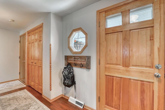 W227N2527 Meadowood Ln, Waukesha, WI 53186 - entrance foyer featuring wood finished floors
