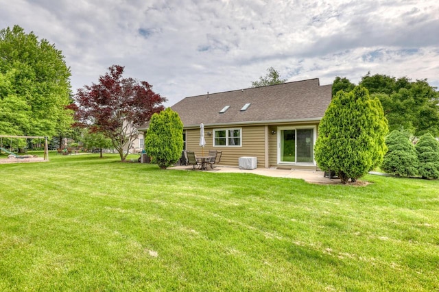 W227N2527 Meadowood Ln, Waukesha, WI 53186 - rear view of house featuring a patio, a yard, and roof with shingles