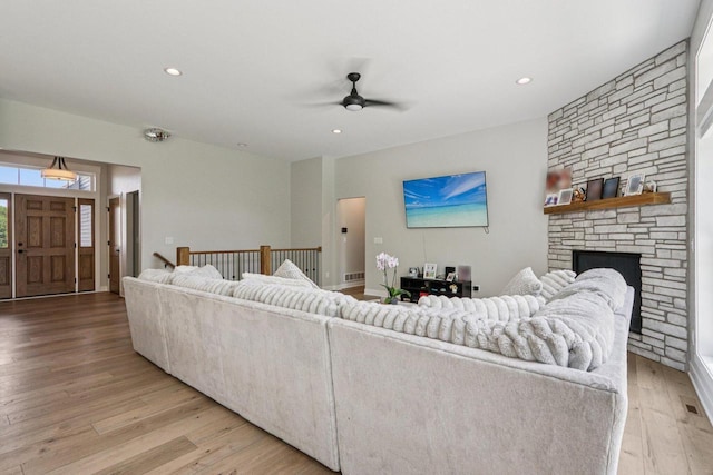 2322 Kae Ct, Mount Pleasant, WI 53406 - living area with a ceiling fan, light wood finished floors, a fireplace, and recessed lighting
