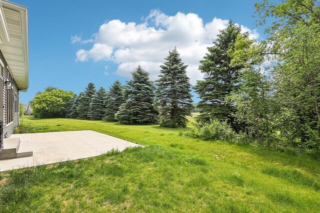 2322 Kae Ct, Mount Pleasant, WI 53406 - view of grassy yard with a patio