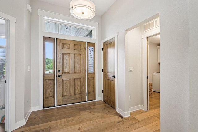 2322 Kae Ct, Mount Pleasant, WI 53406 - foyer entrance with light wood-style floors and baseboards