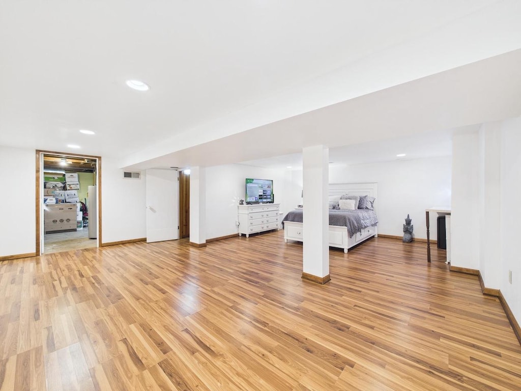 10534 W Stark St, Milwaukee, WI 53225 - unfurnished bedroom with light wood finished floors and recessed lighting