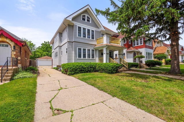 4423 N 30th St Unit 4425, Milwaukee, WI 53209 - victorian home with a front yard, an outdoor structure, and a garage