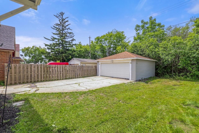 4423 N 30th St Unit 4425, Milwaukee, WI 53209 - view of yard featuring an outdoor structure and a garage