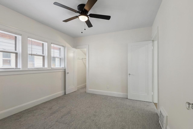 4423 N 30th St Unit 4425, Milwaukee, WI 53209 - unfurnished bedroom with carpet floors and ceiling fan