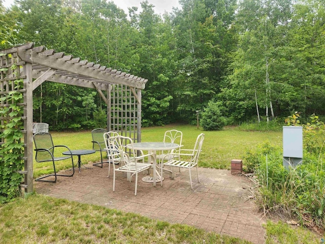 36805 N County Highway J, Bayfield, WI 54814 - view of patio with outdoor dining space and a pergola