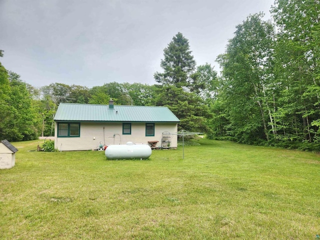 36805 N County Highway J, Bayfield, WI 54814 - back of property with a yard, a metal roof, and a chimney