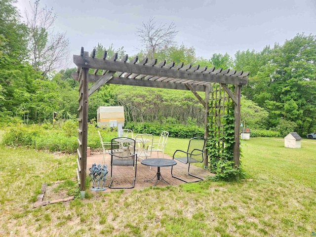 36805 N County Highway J, Bayfield, WI 54814 - view of green lawn featuring a shed, a patio, and a pergola