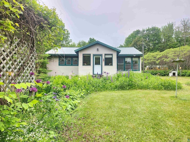 36805 N County Highway J, Bayfield, WI 54814 - view of front facade with a front lawn and a metal roof