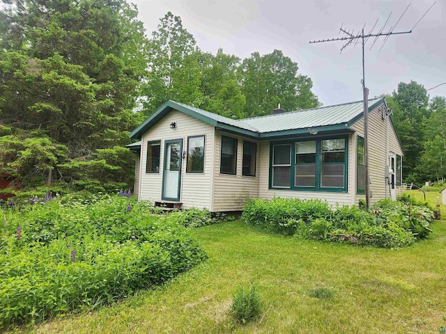 36805 N County Highway J, Bayfield, WI 54814 - view of front of home featuring a front yard and a metal roof