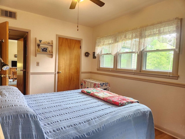 36805 N County Highway J, Bayfield, WI 54814 - bedroom with a ceiling fan and wood finished floors