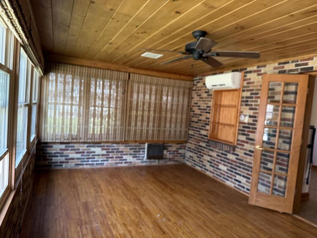 472 Orchard St, Burlington, WI 53105 - unfurnished sunroom with a wall mounted air conditioner