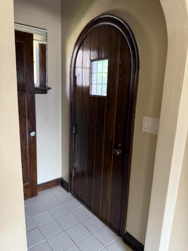 472 Orchard St, Burlington, WI 53105 - foyer entrance featuring arched walkways and light tile patterned floors