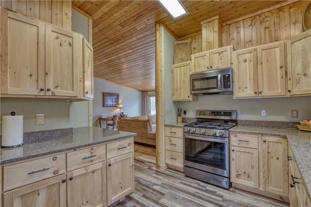 7766 Thunder Point Rd, Hayward, WI 54843 - kitchen with appliances with stainless steel finishes, light brown cabinetry, wooden ceiling, lofted ceiling, and light wood finished floors
