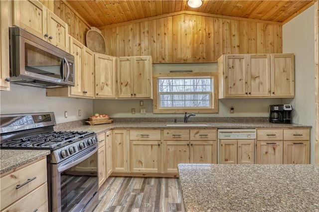 7766 Thunder Point Rd, Hayward, WI 54843 - kitchen featuring appliances with stainless steel finishes, light brown cabinetry, wooden ceiling, lofted ceiling, and light wood-type flooring