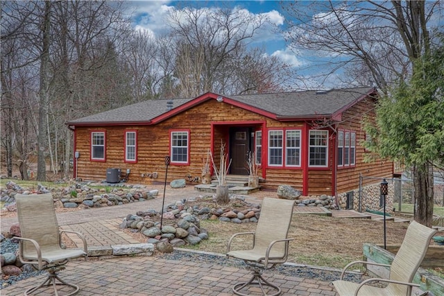 7766 Thunder Point Rd, Hayward, WI 54843 - view of front of home with a patio and roof with shingles