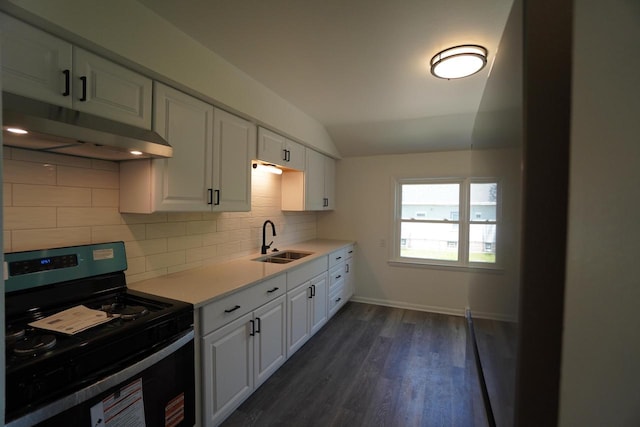 2881 S Linebarger Ter # 2883, Milwaukee, WI 53207 - kitchen with stainless steel range, under cabinet range hood, decorative backsplash, white cabinetry, and light countertops