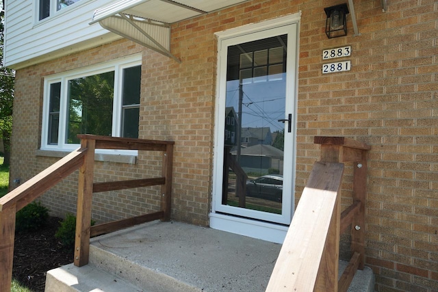 2881 S Linebarger Ter # 2883, Milwaukee, WI 53207 - doorway to property with brick siding