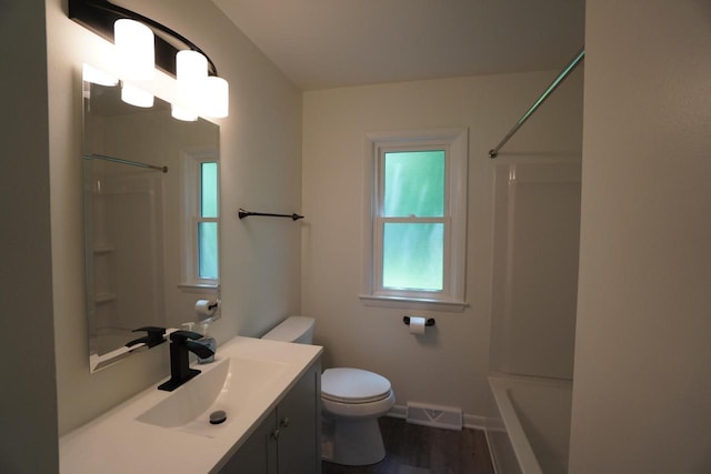 2881 S Linebarger Ter # 2883, Milwaukee, WI 53207 - bathroom featuring vanity, wood finished floors, and bathtub / shower combination