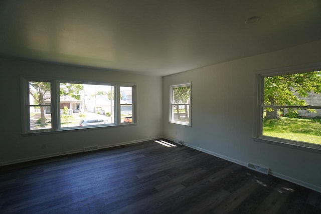 2881 S Linebarger Ter # 2883, Milwaukee, WI 53207 - unfurnished room featuring dark wood-type flooring and baseboards
