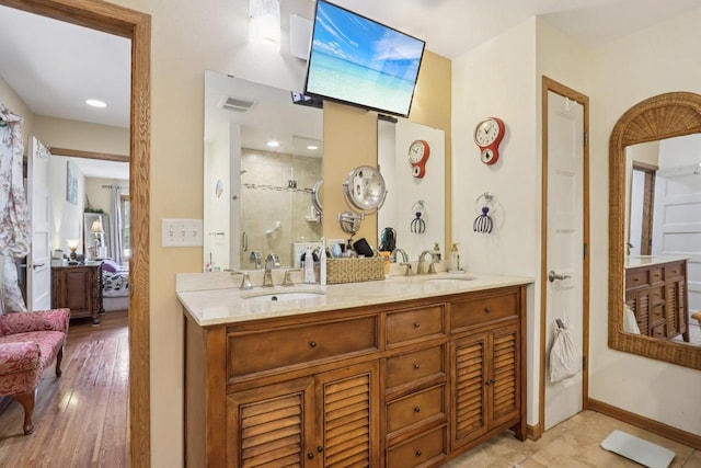 7170 S Countryside Dr, Franklin, WI 53132 - bathroom featuring connected bathroom, double vanity, and a stall shower