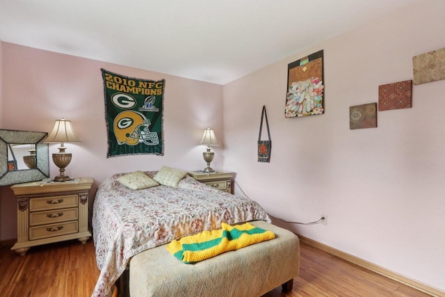 7170 S Countryside Dr, Franklin, WI 53132 - bedroom featuring wood finished floors