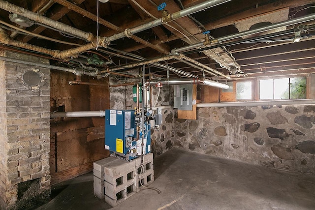 N2485 County Road Ii, Columbus, WI 53925 - below grade area featuring electric panel and a heating unit