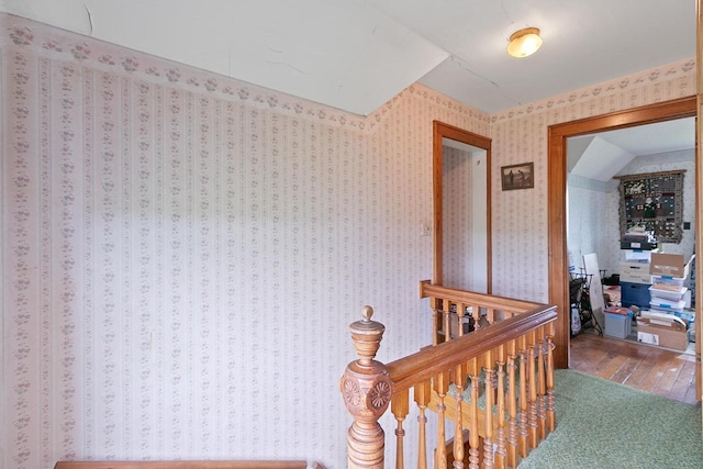 N2485 County Road Ii, Columbus, WI 53925 - hall featuring wood finished floors, an upstairs landing, and wallpapered walls