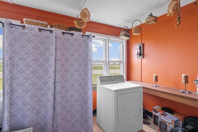 N2485 County Road Ii, Columbus, WI 53925 - washroom featuring washer / clothes dryer and a textured ceiling
