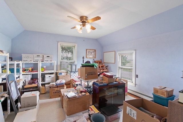 N2485 County Road Ii, Columbus, WI 53925 - office area featuring a baseboard heating unit, vaulted ceiling, ceiling fan, and healthy amount of natural light