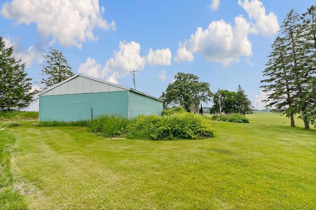 N2485 County Road Ii, Columbus, WI 53925 - view of grassy yard featuring an outbuilding and an outdoor structure