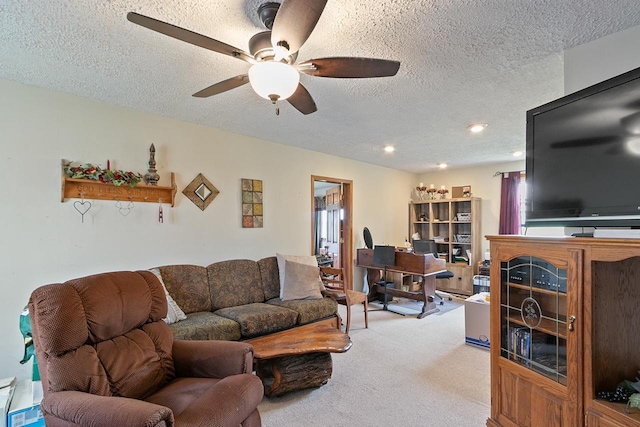 N2485 County Road Ii, Columbus, WI 53925 - living room featuring a ceiling fan, a textured ceiling, and light colored carpet