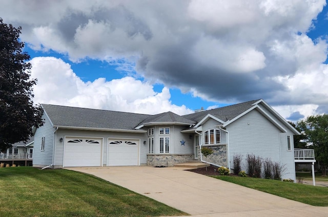 1227 N 3rd St, Monroe, WI 53566 - view of front facade featuring an attached garage, driveway, and a front yard