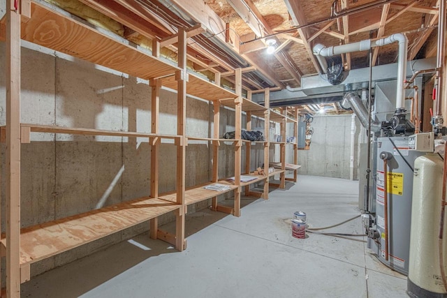 1227 N 3rd St, Monroe, WI 53566 - unfinished below grade area featuring water heater, electric panel, and a water softener