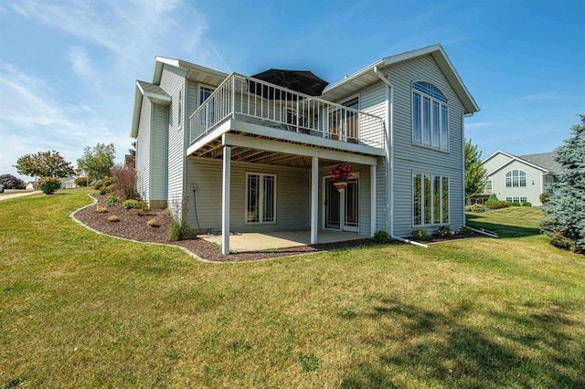 1227 N 3rd St, Monroe, WI 53566 - rear view of house with a patio area, a lawn, and a wooden deck