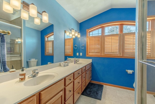 1227 N 3rd St, Monroe, WI 53566 - full bath featuring double vanity, vaulted ceiling, and a shower stall