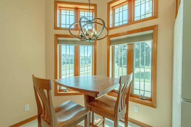 1227 N 3rd St, Monroe, WI 53566 - dining room with a chandelier and a high ceiling