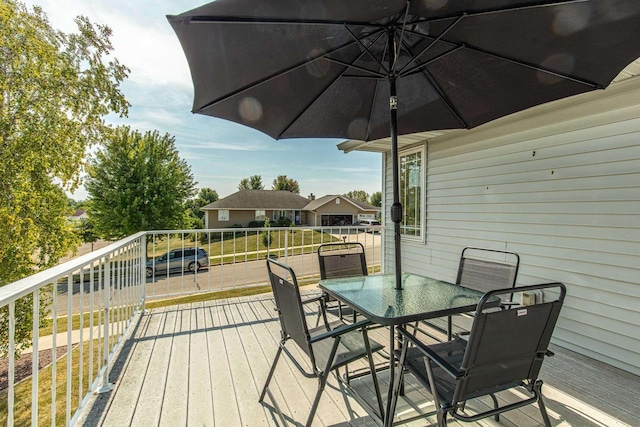 1227 N 3rd St, Monroe, WI 53566 - wooden deck with outdoor dining space