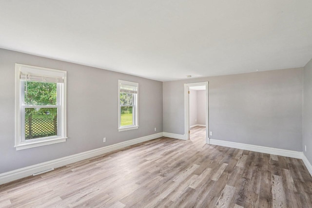 1383 Range Trl, Verona, WI 53593 - unfurnished room featuring wood finished floors and baseboards
