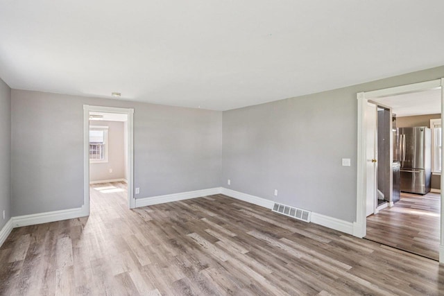 1383 Range Trl, Verona, WI 53593 - unfurnished room featuring wood finished floors