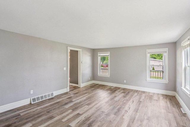 1383 Range Trl, Verona, WI 53593 - spare room featuring light wood-style flooring and baseboards